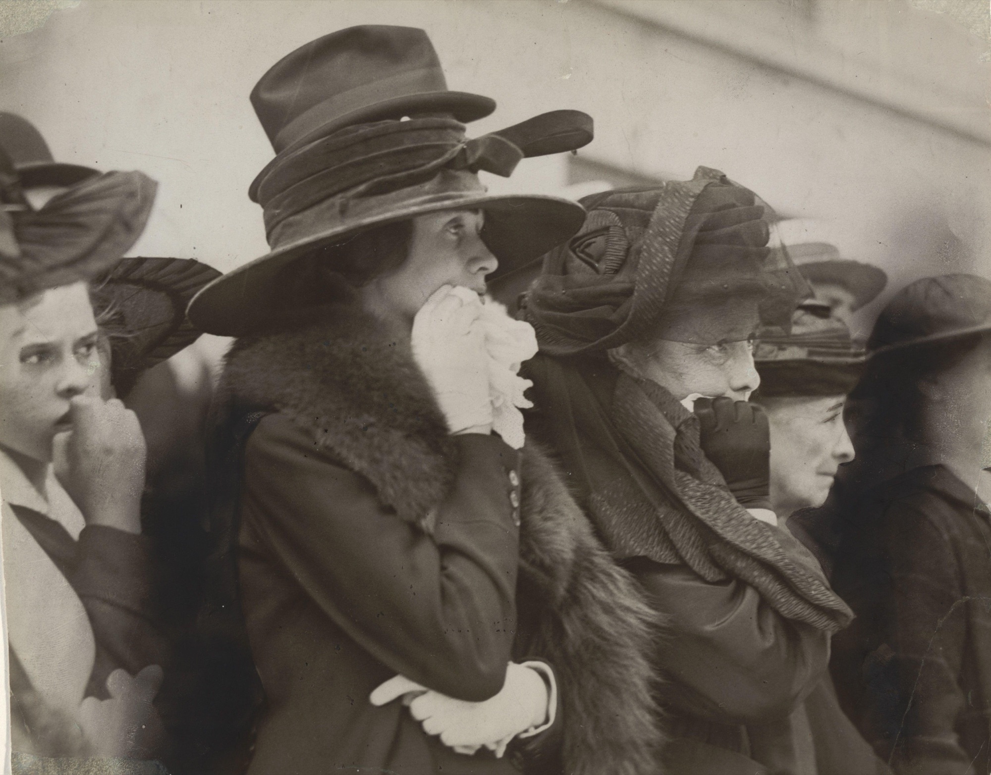 Underwood & Underwood, Mother, Wife, and Sweetheart Watching Boys of the Seventh Regiment as They Marched Away to War, c. 1917 — the caption tells you who they are and how to feel